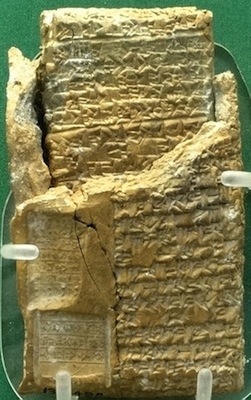 Cuneiform tablet still in its clay case